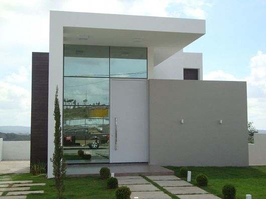 Fachada ou pele de vidro residencial com aluminio preto e vidro refletivo reflecta