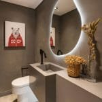 Banheiro com parede cimento queimado e espelho organico com led flutuante show glass (1)